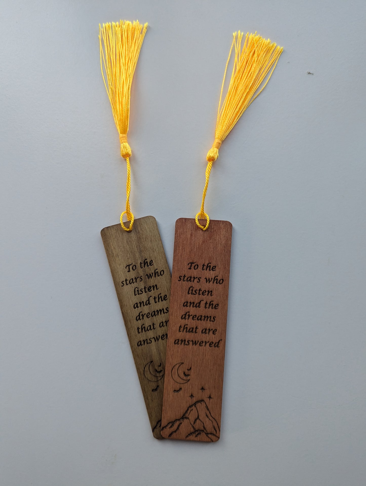 alt="Engraved wooden ACOTAR bookmark with quote 'To the Stars who listen'"