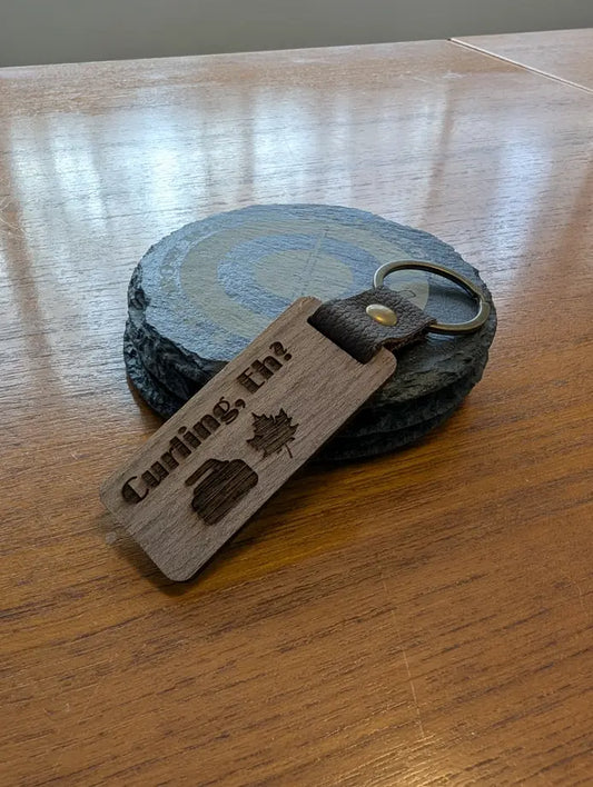 “Curling Eh” Curling Keychain – Laser-Engraved Walnut Wood Keyring
