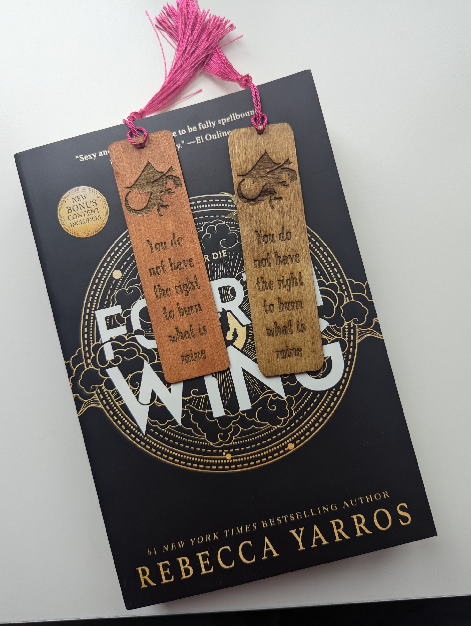 alt="Engraved wooden Fourth Wing bookmark with quote 'Burn what is mine'"