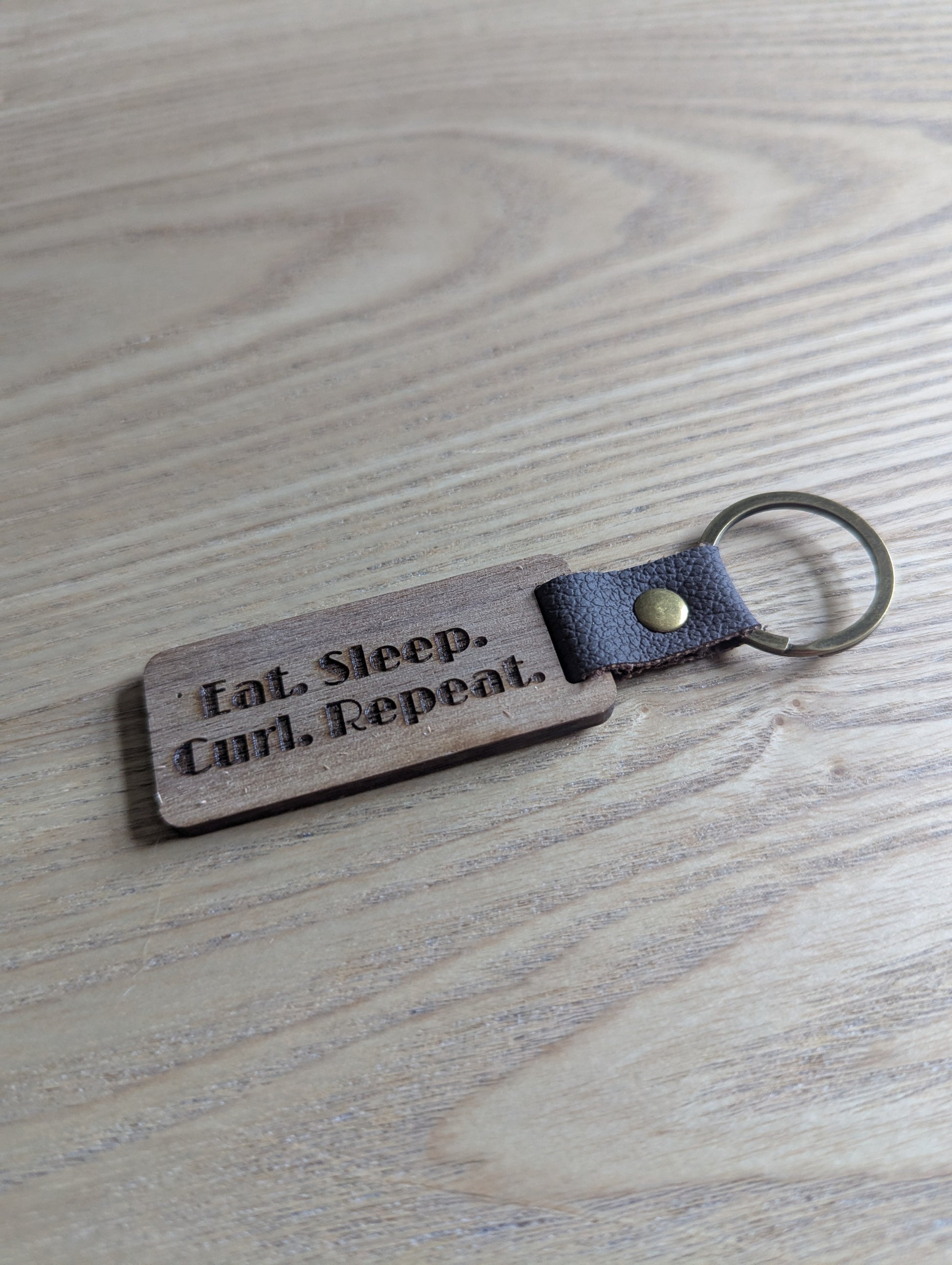 Eat Sleep Curl Repeat Walnut keychain
