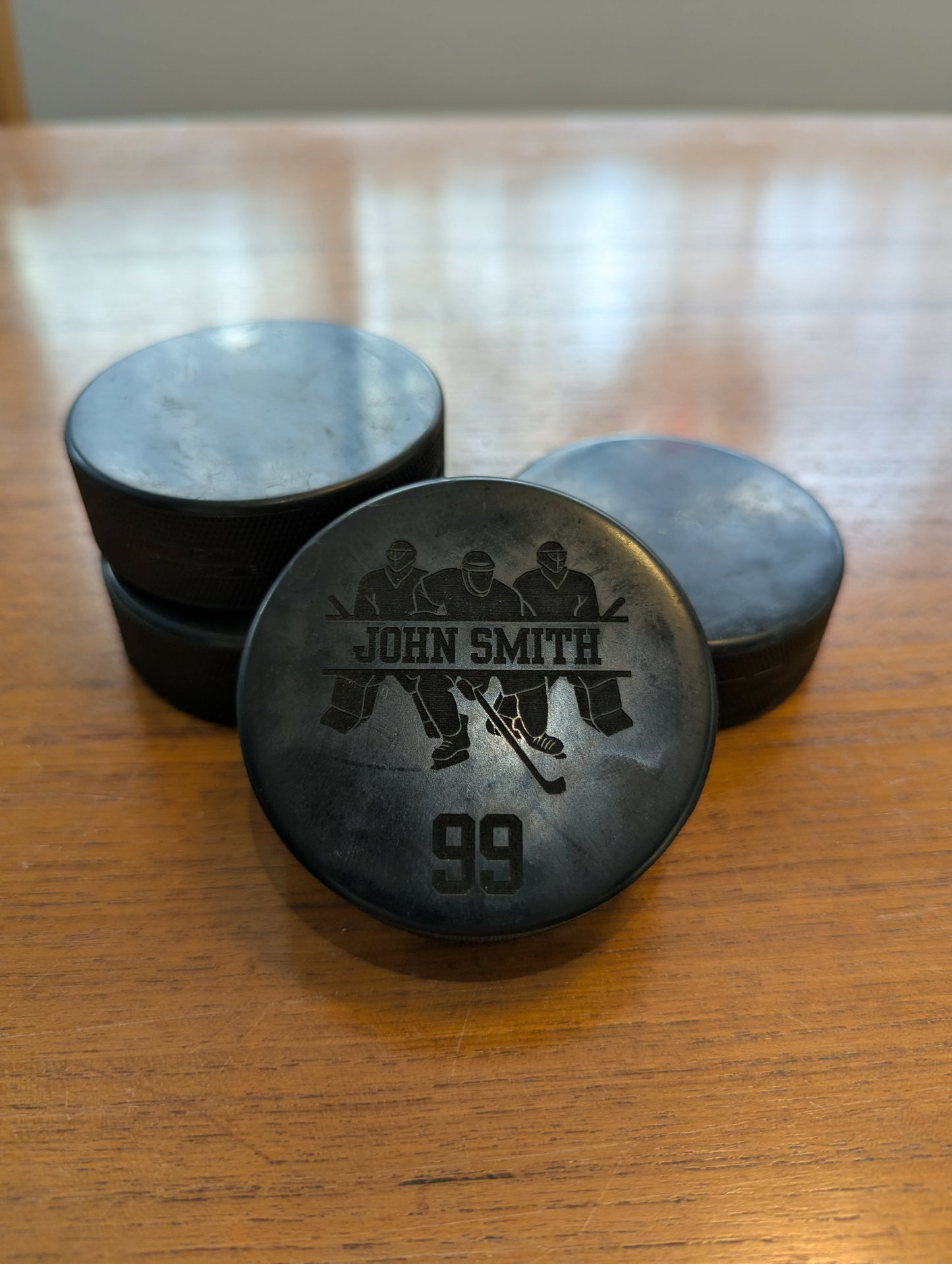 Custom Engraved Hockey Pucks